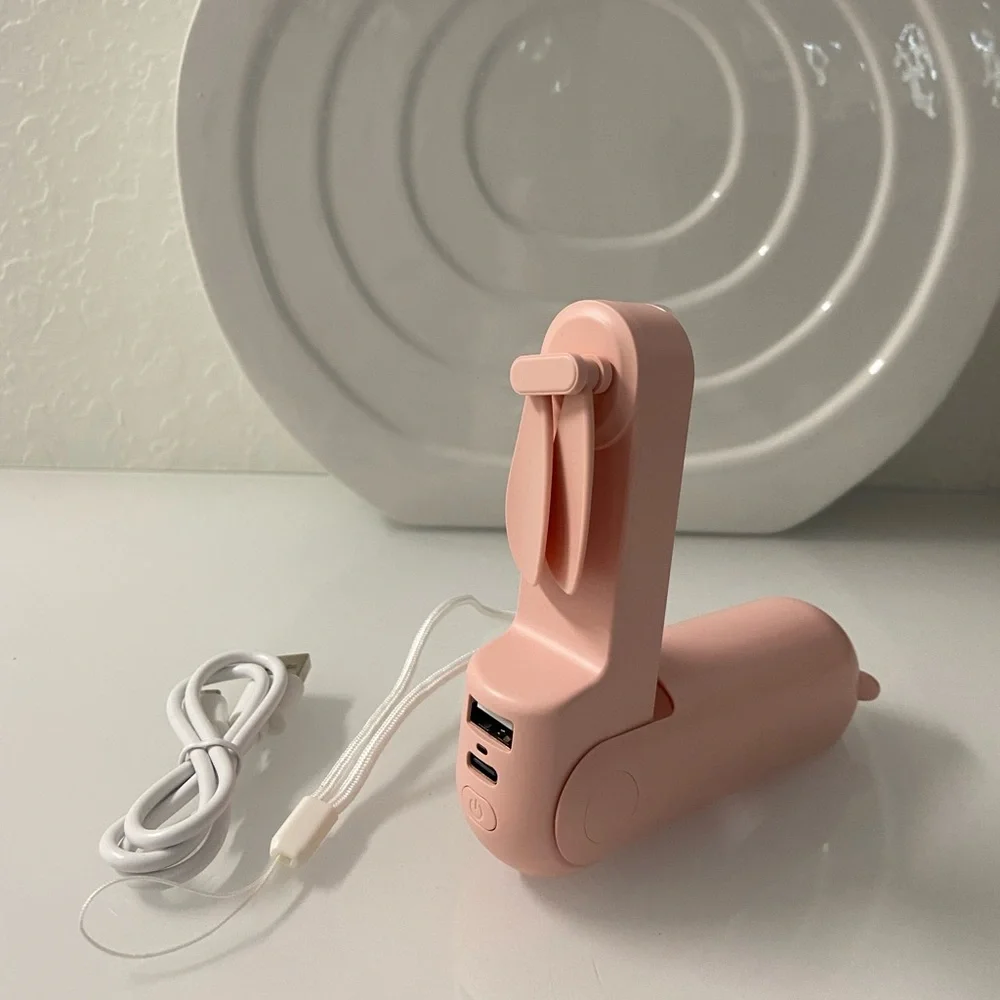 JISULIFE mini handheld fan. 3 in 1, flashlight, power bank, rechargeable fan